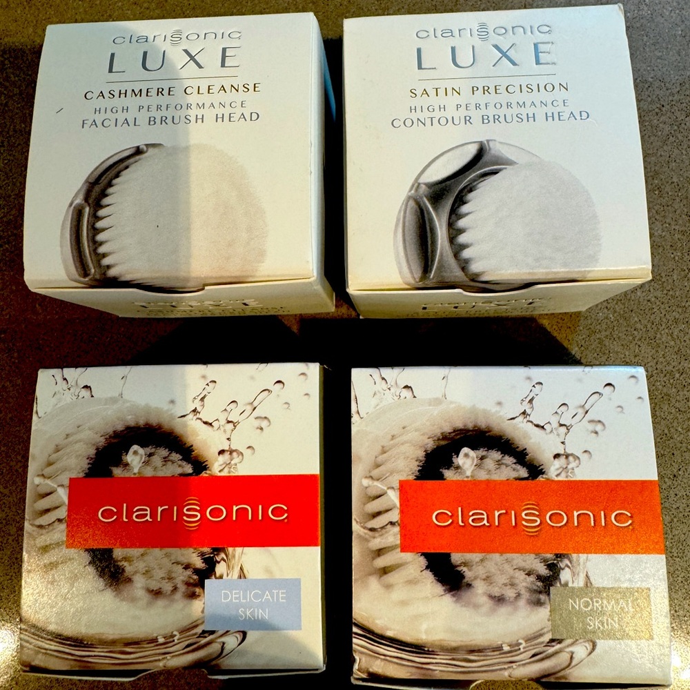 Four Clarisonic replacement brush heads NIB